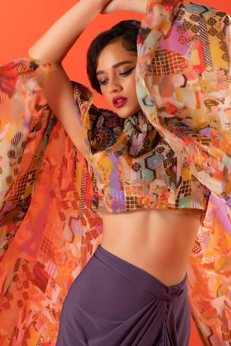 Pds By Sneha Multi Color Lycra Print Abstract High Neck Cape Top With Skirt at Aza Fashions Pds By Sneha_Multi Color Lycra Print Abstract High Neck Cape Top With Skirt _at_Aza_Fashions