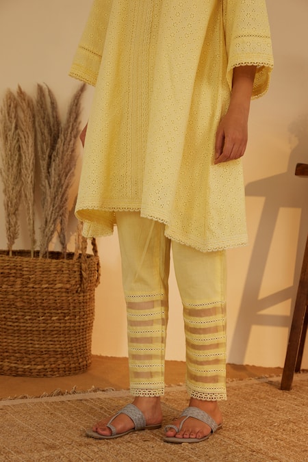 Shrutkirti_Yellow Pure Cotton Embroidery Floral V Schiffli Pattern Kurta Pant Set _at_Aza_Fashions