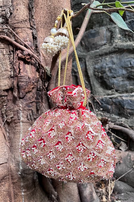 Shop Nayaab By Sonia Red Embroidery, Sequins, Pearls Vieira Scallop Embellished Potli at Aza Fashions Shop_Nayaab By Sonia_Red Embroidery, Sequins, Pearls Vieira Scallop Embellished Potli _at_Aza_Fashions