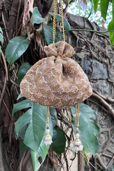 Shop Nayaab By Sonia Gold Embroidery, Sequins Viera Silk Embellished Potli at Aza Fashions Shop_Nayaab By Sonia_Gold Embroidery, Sequins Viera Silk Embellished Potli _at_Aza_Fashions