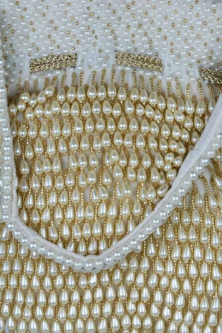 Nayaab By Sonia Off White Pearls, Tassels Treasure Taselled Potli Online at Aza Fashions Nayaab By Sonia_Off White Pearls, Tassels Treasure Taselled Potli _Online_at_Aza_Fashions