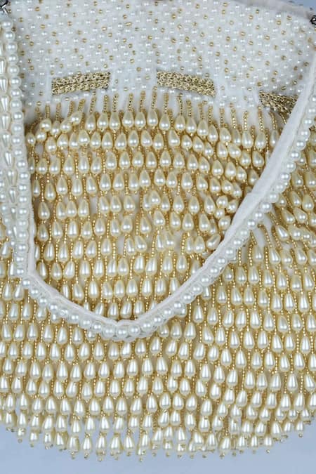 Buy Nayaab By Sonia Off White Pearls, Tassels Treasure Taselled Potli Online at Aza Fashions Buy_Nayaab By Sonia_Off White Pearls, Tassels Treasure Taselled Potli _Online_at_Aza_Fashions