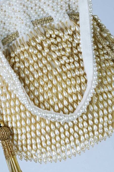 Nayaab By Sonia Off White Pearls, Tassels Treasure Taselled Potli at Aza Fashions Nayaab By Sonia_Off White Pearls, Tassels Treasure Taselled Potli _at_Aza_Fashions