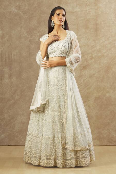 Shop_Keerthi Kadire_Blue Net Hand Embroidered Pearl Scallop Neck Blouse Bridal Lehenga Set _Online_at_Aza_Fashions
