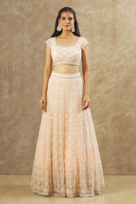 Buy_Keerthi Kadire_Pink Net Embroidery, Pearls Round Neck Hand Bridal Lehenga Set _Online_at_Aza_Fashions