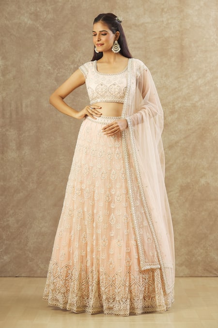 Keerthi Kadire_Pink Net Embroidery, Pearls Round Neck Hand Bridal Lehenga Set _at_Aza_Fashions