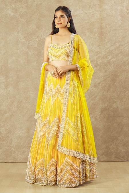 Keerthi Kadire_Yellow Net Pearls Sweetheart Neck Embroidered Blouse Bridal Lehenga Set _Online_at_Aza_Fashions