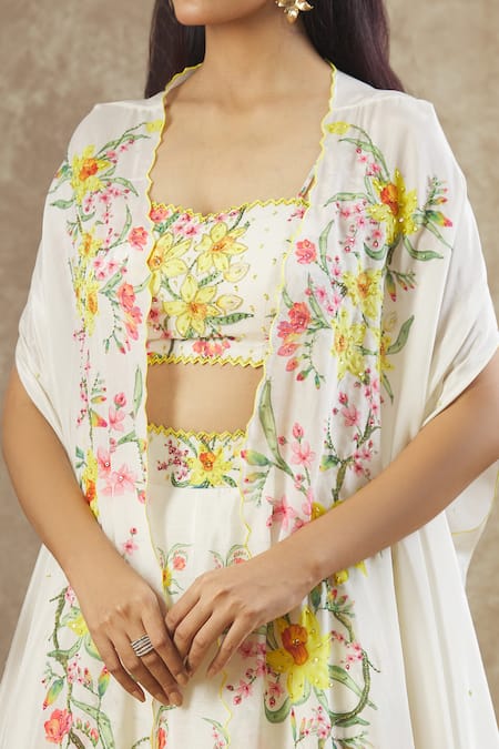 Keerthi Kadire Off White Chinon Silk Printed Floral Sweetheart Neck Cape Lehenga Set at Aza Fashions Keerthi Kadire_Off White Chinon Silk Printed Floral Sweetheart Neck Cape Lehenga Set _at_Aza_Fashions