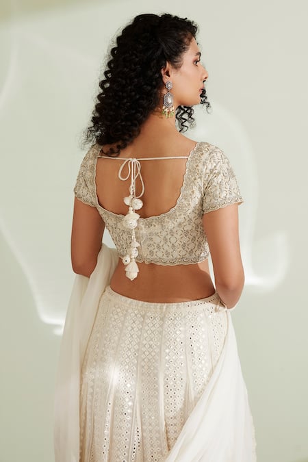 Shop 1999ad By Amita & Deepak White Georgette Sequins, Mirrors V-neck Fleur Lehenga Set at Aza Fashions Shop_1999ad By Amita & Deepak_White Georgette Sequins, Mirrors V-neck Fleur Lehenga Set _at_Aza_Fashions