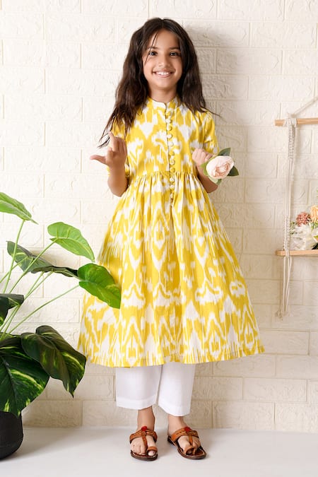 Buy The Cotton Staple Yellow Cotton Sunflower Ikat Print Kurta With Pant Online at Aza Fashions Buy_The Cotton Staple_Yellow Cotton Sunflower Ikat Print Kurta With Pant _Online_at_Aza_Fashions