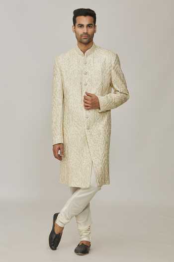 Buy Nero By Shaifali And Satya Ivory Dupion Silk Embroidered Cutdana Geometric Thread Sherwani With Churidar at Aza Fashions Buy_Nero By Shaifali And Satya_Ivory Dupion Silk Embroidered Cutdana Geometric Thread Sherwani With Churidar_at_Aza_Fashions