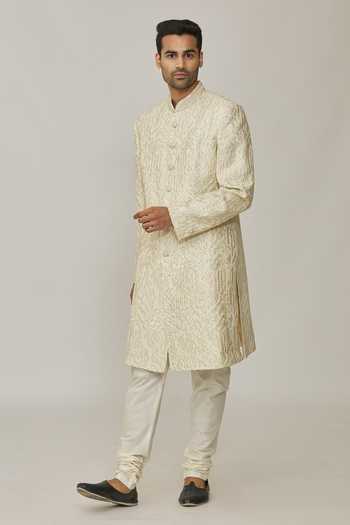 Shop Nero By Shaifali And Satya Ivory Dupion Silk Embroidered Cutdana Geometric Thread Sherwani With Churidar Online at Aza Fashions Shop_Nero By Shaifali And Satya_Ivory Dupion Silk Embroidered Cutdana Geometric Thread Sherwani With Churidar_Online_at_Aza_Fashions