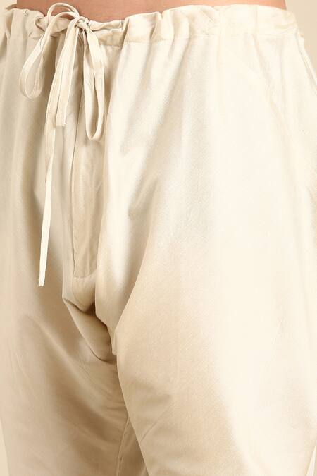 Mayank Modi - Men Yellow Silk Jacquard Overlap Kurta And Churidar Set at Aza Fashions Mayank Modi - Men_Yellow Silk Jacquard Overlap Kurta And Churidar Set _at_Aza_Fashions