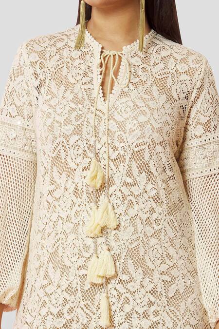 Bhairavi Jaikishan_Ivory Tie-up Frill Hem Kurta_at_Aza_Fashions