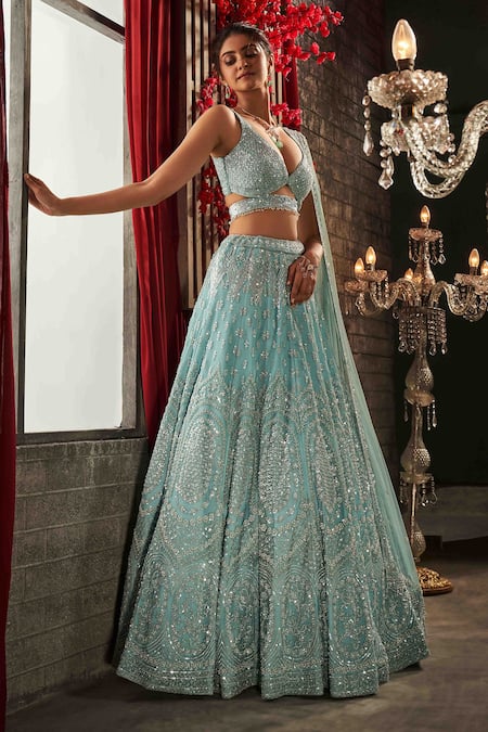 Shop Annus Creation Blue Net Sequins, Pearls, Cut Work Plunge Neck And Embroidered Lehenga Set at Aza Fashions Shop_Annus Creation_Blue Net Sequins, Pearls, Cut Work Plunge Neck And Embroidered Lehenga Set_at_Aza_Fashions