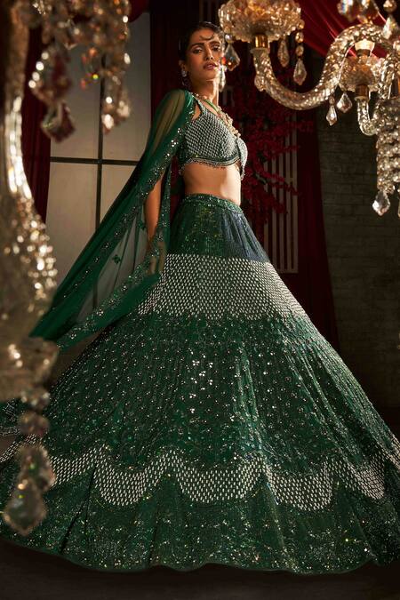 Shop Annus Creation Emerald Green Net Sequins, Pearls V-neck And Embroidered Lehenga Set at Aza Fashions Shop_Annus Creation_Emerald Green Net Sequins, Pearls V-neck And Embroidered Lehenga Set_at_Aza_Fashions