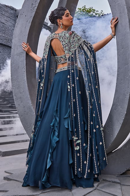 Shop Miku Kumar Blue Georgette, Viscose Tassels V-neck Embroidered Cape Draped Lehenga Set at Aza Fashions Shop_Miku Kumar_Blue Georgette, Viscose Tassels V-neck Embroidered Cape Draped Lehenga Set _at_Aza_Fashions