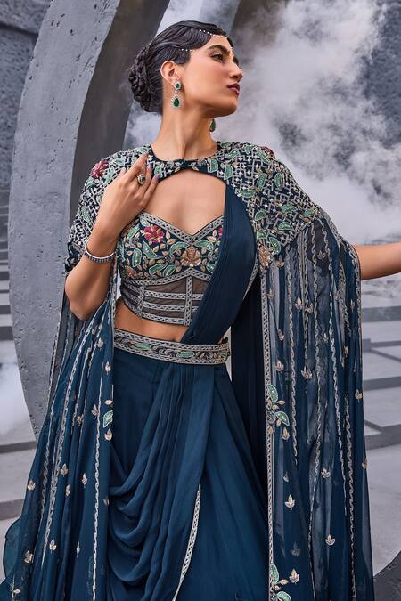 Miku Kumar Blue Georgette, Viscose Tassels V-neck Embroidered Cape Draped Lehenga Set Online at Aza Fashions Miku Kumar_Blue Georgette, Viscose Tassels V-neck Embroidered Cape Draped Lehenga Set _Online_at_Aza_Fashions