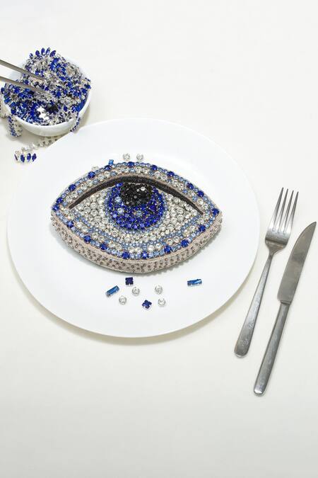 Ozel_Silver Embellished Evil Eye Rhinestone Studded Clutch_Online_at_Aza_Fashions