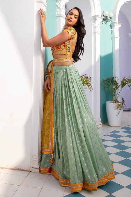 Jiya By Veer Design Studio Green Brocade, Chiffon Embroidery, Tassels Boat Neck Thread Lehenga Set at Aza Fashions Jiya By Veer Design Studio_Green Brocade, Chiffon Embroidery, Tassels Boat Neck Thread Lehenga Set _at_Aza_Fashions