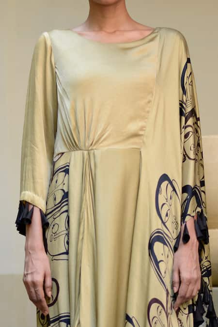 Ekru Beige Chanderi, Modal Tassels Round Neck Human Portrait Print Drape Dress Online at Aza Fashions Ekru_Beige Chanderi, Modal Tassels Round Neck Human Portrait Print Drape Dress_Online_at_Aza_Fashions