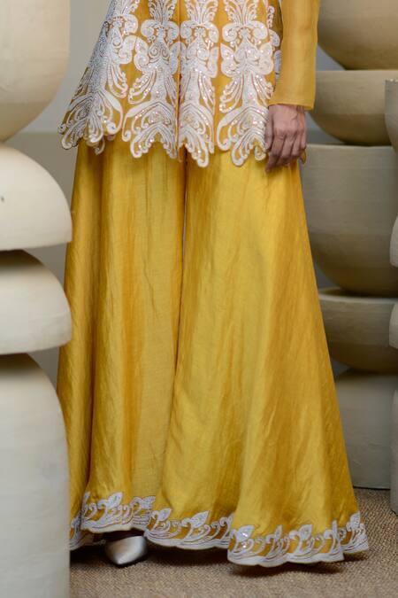 Ekru Yellow Organza, Linen, Satin Mandala Embroidered Peplum Tunic With Sharara Online at Aza Fashions Ekru_Yellow Organza, Linen, Satin Mandala Embroidered Peplum Tunic With Sharara_Online_at_Aza_Fashions