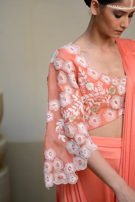 Shop_Ekru_Peach Organza, Modal Embroidery V-neck Pre-draped Saree With Floral Blouse_Online_at_Aza_Fashions