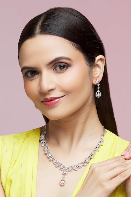 Buy Chaotiq By Arti Silver Plated Diamonds Floral American Necklace Set at Aza Fashions Buy_Chaotiq By Arti_Silver Plated Diamonds Floral American Necklace Set_at_Aza_Fashions