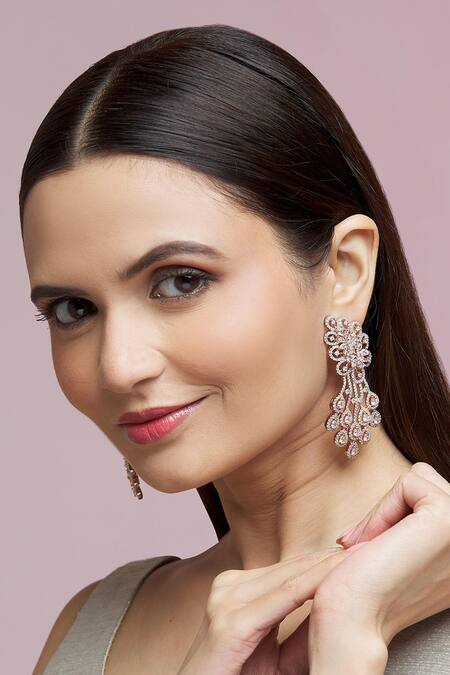 Buy Chaotiq By Arti Gold Plated Artificial Stones Floral Studded Earrings at Aza Fashions Buy_Chaotiq By Arti_Gold Plated Artificial Stones Floral Studded Earrings_at_Aza_Fashions