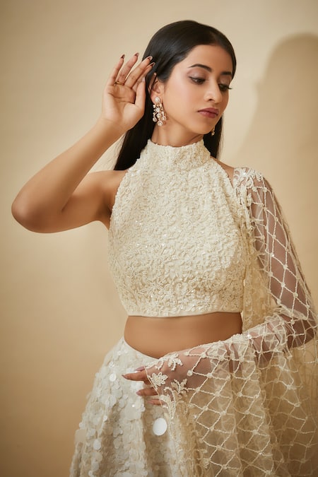 Buy Premya By Manishii White Silk, Chiffon, Tulle Sequins Halter Neck Hand Embroidered Lehenga Set Online at Aza Fashions Buy_Premya By Manishii_White Silk, Chiffon, Tulle Sequins Halter Neck Hand Embroidered Lehenga Set _Online_at_Aza_Fashions