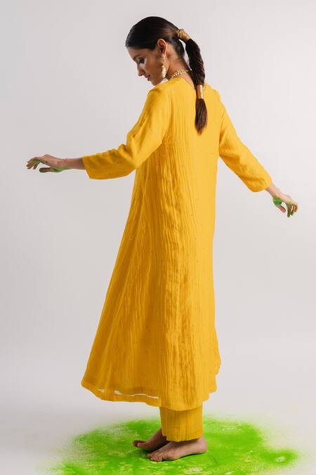 Shop Tussah By Siddhi Shah Yellow Chanderi Hand Embroidered Sequins V A-line Kurta And Pant Set at Aza Fashions Shop_Tussah By Siddhi Shah_Yellow Chanderi Hand Embroidered Sequins V A-line Kurta And Pant Set _at_Aza_Fashions