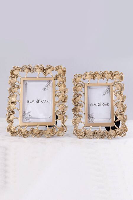 Shop Elm & Oak Gold Stainless Steel Carved Work Ginkgo Leaf Frame Set at Aza Fashions Shop_Elm & Oak_Gold Stainless Steel Carved Work Ginkgo Leaf Frame Set_at_Aza_Fashions