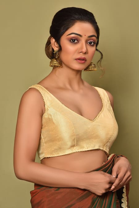 Shop_Samyukta Singhania_Gold Silk Lace Asymmetric Border Embroidered Sleeveless Blouse_Online_at_Aza_Fashions