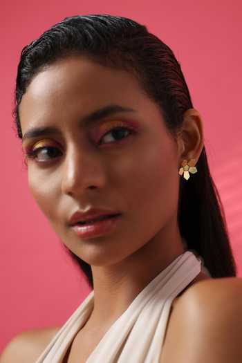 Varnika Arora_Gold Plated Adler Floral Pattern Studs _at_Aza_Fashions