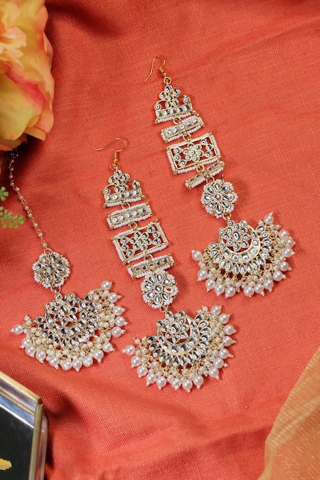 Shop Ishhaara Gold Plated Stones, Kundan Geometric Floral Chandbali Earring And Maangtikka at Aza Fashions Shop_Ishhaara_Gold Plated Stones, Kundan Geometric Floral Chandbali Earring And Maangtikka _at_Aza_Fashions