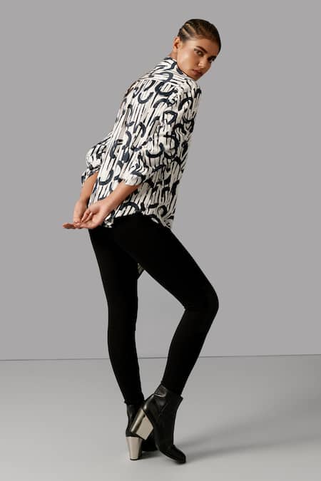 Shop Devina Juneja Black Cotton Collared Geometric Print Asymmetric Shirt at Aza Fashions Shop_Devina Juneja_Black Cotton Collared Geometric Print Asymmetric Shirt _at_Aza_Fashions