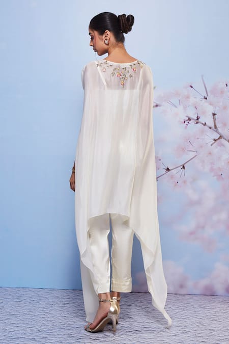 Shop Ajiesh Oberoi Ivory Cotton, Satin, Chiffon Embroidery Sweetheart Asymmetric Cape Pant Set at Aza Fashions Shop_Ajiesh Oberoi_Ivory Cotton, Satin, Chiffon Embroidery Sweetheart Asymmetric Cape Pant Set _at_Aza_Fashions