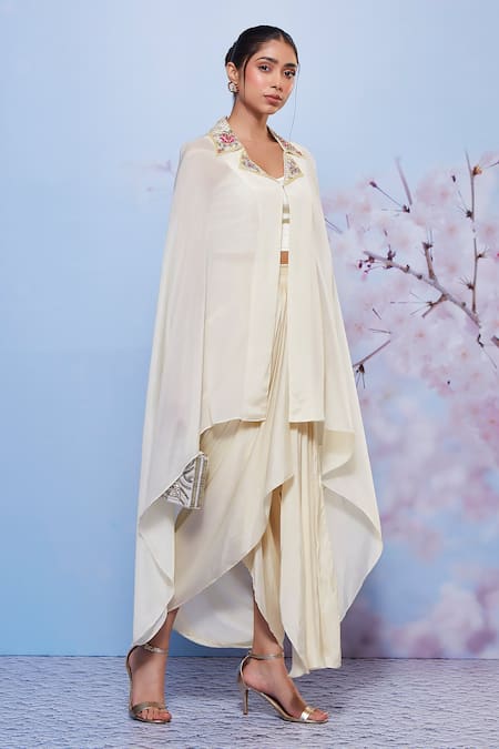 Ajiesh Oberoi_Ivory Chiffon, Modal, Lycra Embroidery, Sequins Cape And Draped Skirt Set _Online_at_Aza_Fashions