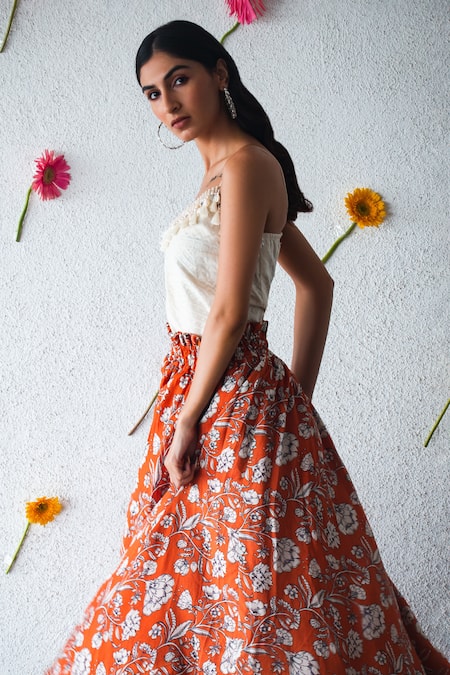 Shop Shachi Sood Orange Chanderi, Silk Tassels, Mirrors Round Neck Floral Print Skirt And Top Set at Aza Fashions Shop_Shachi Sood_Orange Chanderi, Silk Tassels, Mirrors Round Neck Floral Print Skirt And Top Set _at_Aza_Fashions