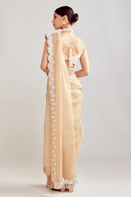 Shop Vvani By Vani Vats Beige Organza, Georgette Pearls Sweetheart Neck Saree With Embellished Blouse at Aza Fashions Shop_Vvani By Vani Vats_Beige Organza, Georgette Pearls Sweetheart Neck Saree With Embellished Blouse _at_Aza_Fashions