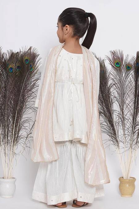 Shop Little Bansi Cream Cotton, Chiffon Mirrors, Embroidery Kurta Sharara Set at Aza Fashions Shop_Little Bansi_Cream Cotton, Chiffon Mirrors, Embroidery Kurta Sharara Set_at_Aza_Fashions