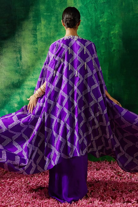 Pink City By Sarika Purple Silk Embroidery, Mirrors Round Bandhani Pattern Cape Draped Skirt Set Online at Aza Fashions Pink City By Sarika_Purple Silk Embroidery, Mirrors Round Bandhani Pattern Cape Draped Skirt Set _Online_at_Aza_Fashions