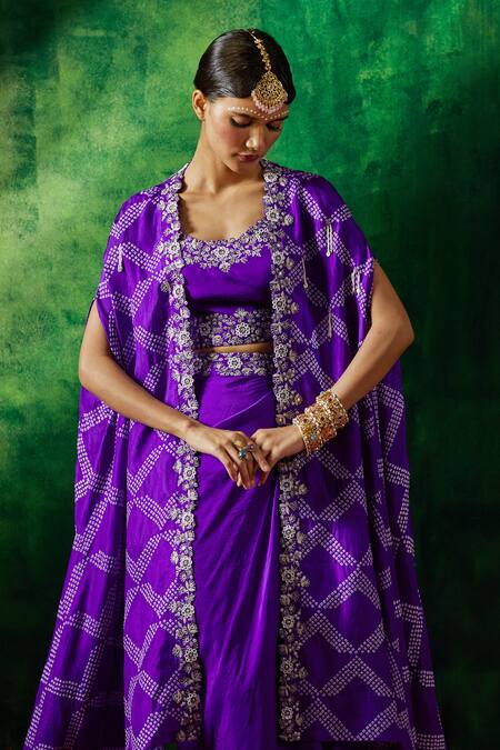 Buy Pink City By Sarika Purple Silk Embroidery, Mirrors Round Bandhani Pattern Cape Draped Skirt Set Online at Aza Fashions Buy_Pink City By Sarika_Purple Silk Embroidery, Mirrors Round Bandhani Pattern Cape Draped Skirt Set _Online_at_Aza_Fashions