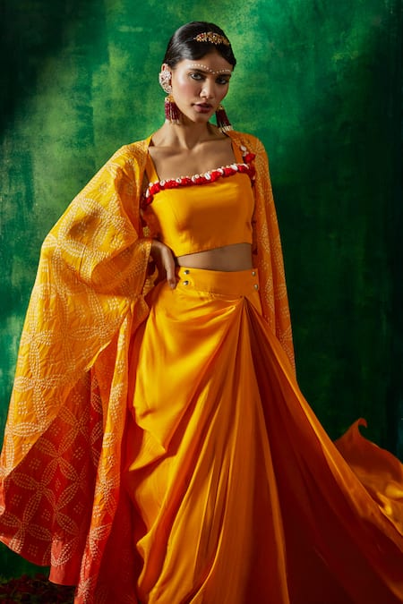 Pink City By Sarika_Yellow Silk Tassels, Embroidery Square Neck Bandhani Cape Draped Skirt Set _at_Aza_Fashions