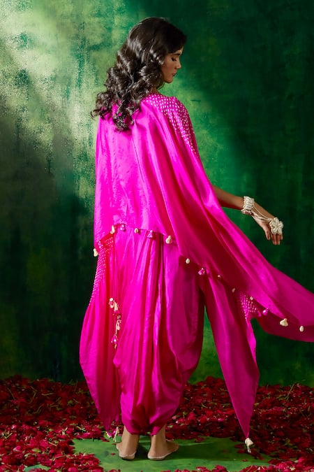 Shop Pink City By Sarika Pink Silk Tassels Bandhani Print Asymmetric Cape And Skirt Set at Aza Fashions Shop_Pink City By Sarika_Pink Silk Tassels Bandhani Print Asymmetric Cape And Skirt Set _at_Aza_Fashions