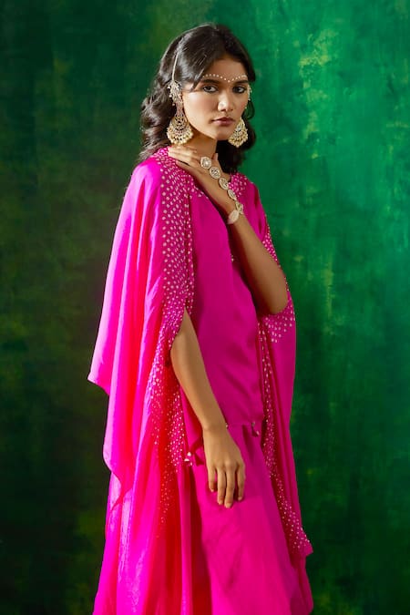 Shop Pink City By Sarika Pink Silk Tassels Bandhani Print Asymmetric Cape And Skirt Set Online at Aza Fashions Shop_Pink City By Sarika_Pink Silk Tassels Bandhani Print Asymmetric Cape And Skirt Set _Online_at_Aza_Fashions