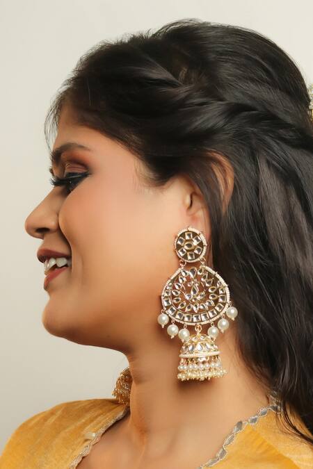 Ishhaara Gold Plated Pearls, Stones Oval Shaped Jhumkas at Aza Fashions Ishhaara_Gold Plated Pearls, Stones Oval Shaped Jhumkas _at_Aza_Fashions