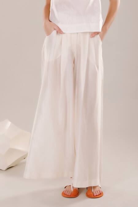 DHI_White Twill (97% + 3% Lycra) Plain Pleated Flared Pant _Online_at_Aza_Fashions