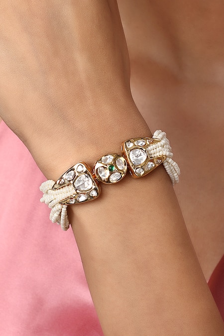 HRISHA Cream Crystals, Pearls Kediya Moti Embellished Bracelet 