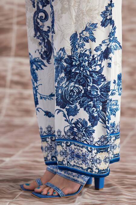 Rajdeep Ranawat White Satin Permaz Floral Print Flared Pant at Aza Fashions Rajdeep Ranawat_White Satin Permaz Floral Print Flared Pant _at_Aza_Fashions